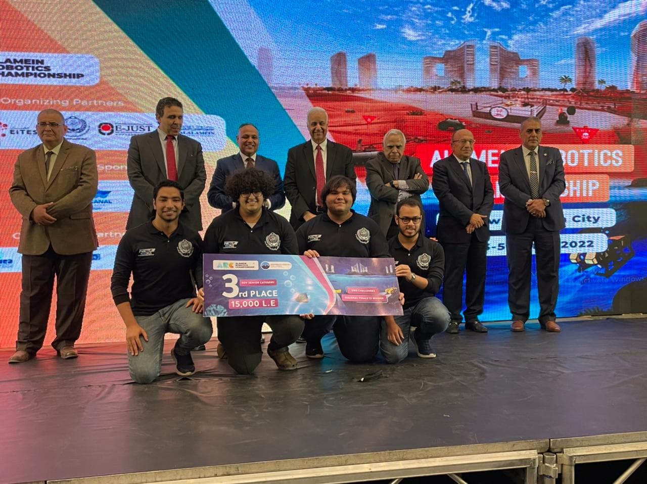 Our team at the Alamein Robotics Championship holding an ROV senior category third-place award